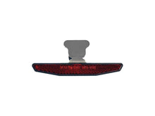 Red reflector for mounting in license plate base plate